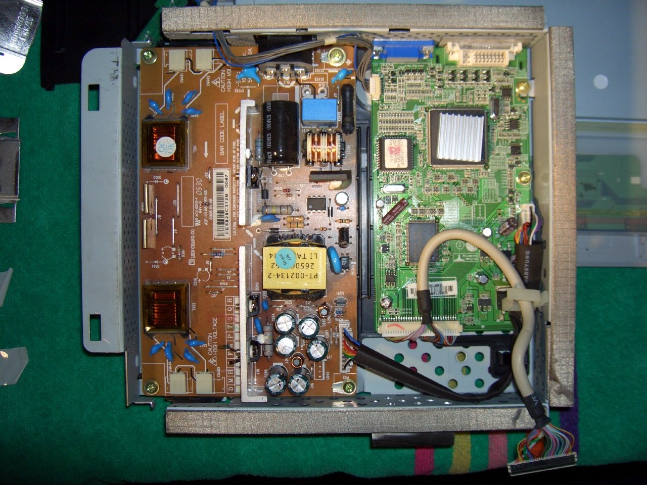 view of logic module from above showing the mains supply to DC converter in the middle